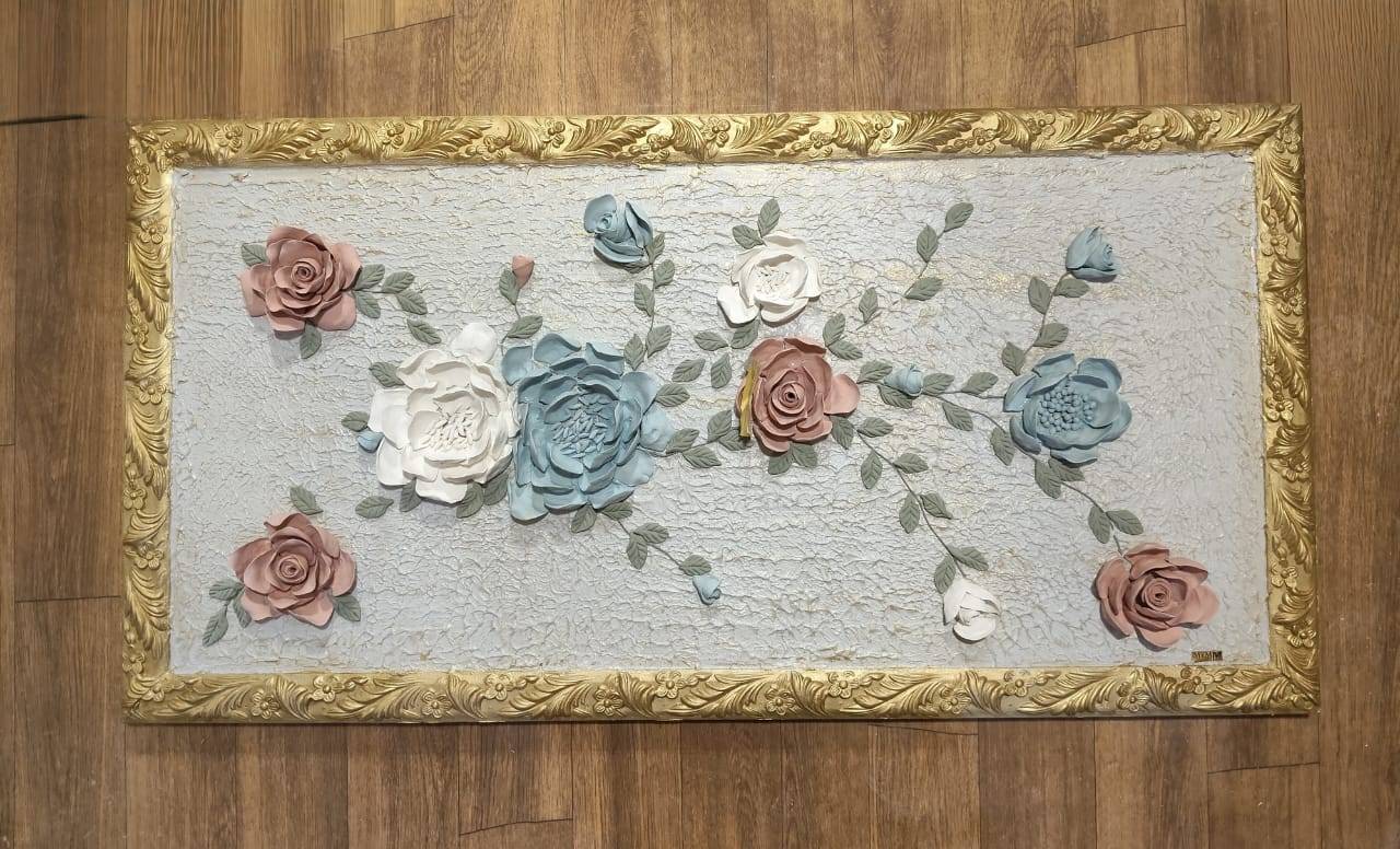 Landscape framed panel with blue, ivory and rose sculpted flowers on a crackled surface
