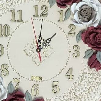 The clock face with gilded numerals